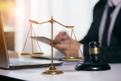 Close-up of electric lamp on table