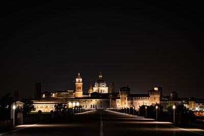 Illuminated buildings in city at night