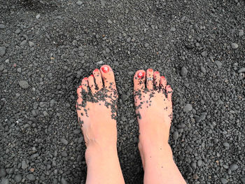 Low section of woman at beach