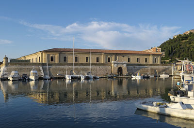 Boats moored at waterfront