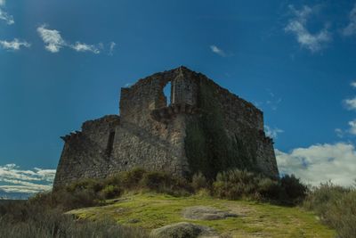 Low angle view of ruins against clear sky