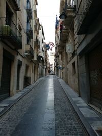 Street amidst residential buildings