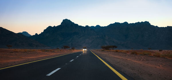 Empty road against sky