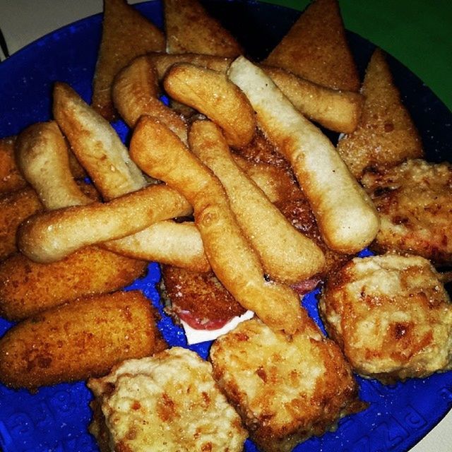 food, food and drink, freshness, indoors, ready-to-eat, still life, close-up, meat, healthy eating, meal, french fries, high angle view, plate, fried, indulgence, prepared potato, deep fried, table, snack