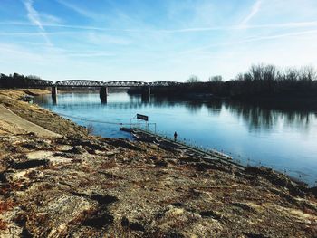 Bridge over river against sky