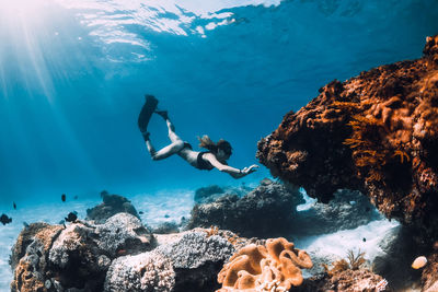 Full length of woman swimming in sea