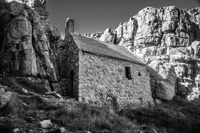 Low angle view of old building against sky