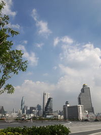 Modern buildings against sky in city