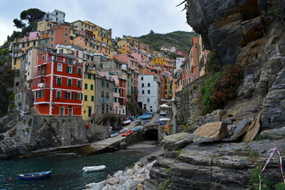 Buildings in city against sky