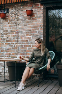 Young beautiful woman with long hair enjoying springtime.