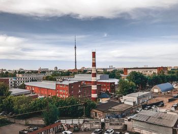 High angle view of buildings in city against sky