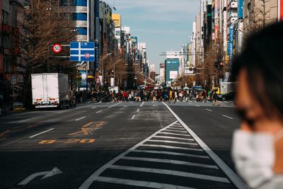 Road in city against sky