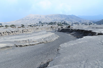 Scenic view of desert against sky