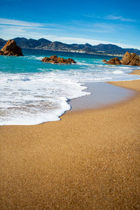 Scenic view of beach against sky
