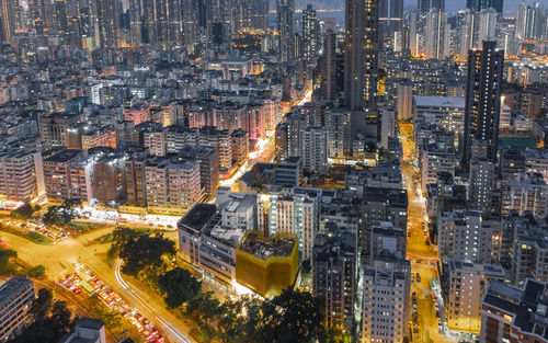 High angle view of illuminated buildings in city