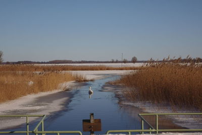 View of lake against clear sky