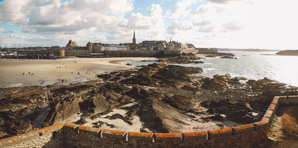 Panoramic view of sea against cloudy sky