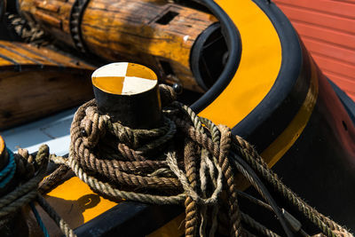 Close-up of rope tied on wood