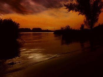 Scenic view of sea at sunset