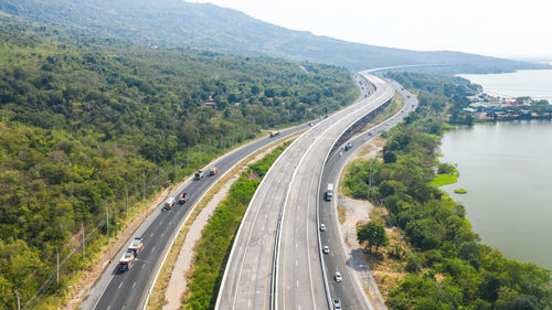 High angle view of highway amidst trees