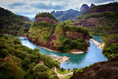 High angle view of river passing through mountains