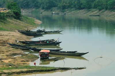 Fishing boat moored on lake