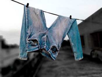 Close-up of clothes drying on clothesline