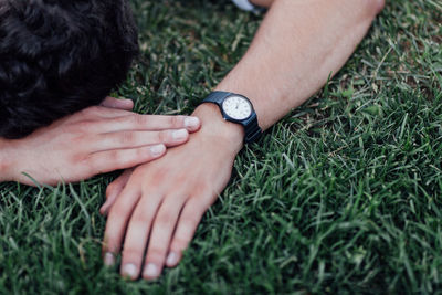 Low section of people on grass