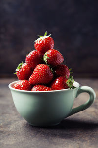 Close-up of strawberries in bowl on table