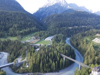 High angle view of trees and mountains against sky