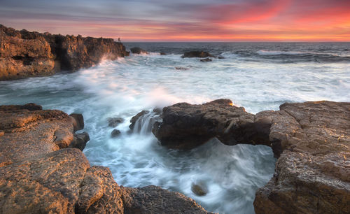 Scenic view of sea against sky during sunset