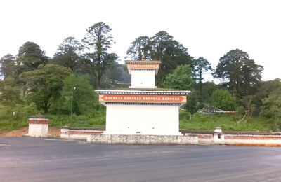 Built structure against trees against sky