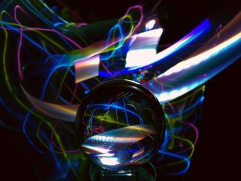 Close-up of illuminated crystal ball