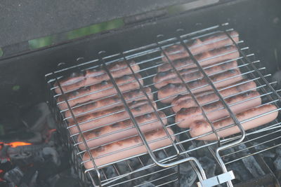 High angle view of food on metal grate