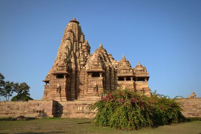 View of temple against clear blue sky