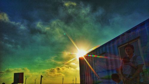 Exterior of house against sky during sunset