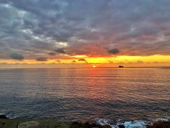 Scenic view of sea against sky during sunset