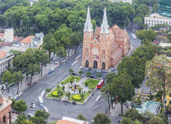 High angle view of road amidst trees in city