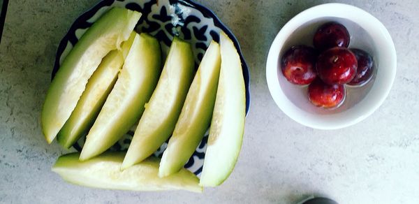 High angle view of fruits in plate on table