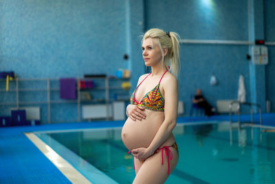 Young woman in swimming pool