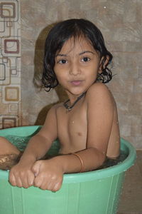 Portrait of woman in bathtub