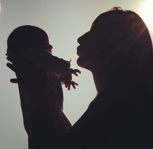 Silhouette of man with hands