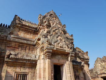 Low angle view of statue of historic building