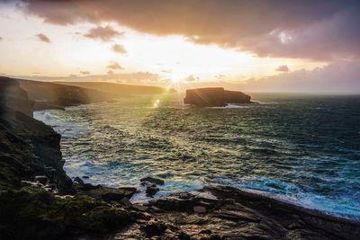 Scenic view of sea against sky during sunset