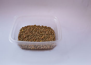 High angle view of food in bowl against white background