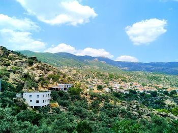 Scenic view of townscape against sky