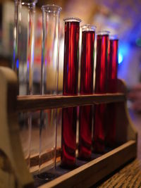 Close-up of alcohol in test tubes on stand