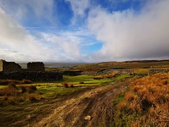 Scenic view of land against sky