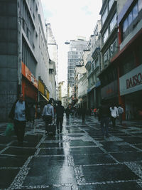 People walking on city street