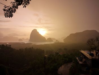 Scenic view of mountains against sky during sunset